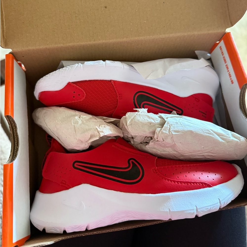 red nike shoes (kids) size: 12